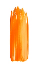 Photo of Abstract brushstroke of orange paint isolated on white