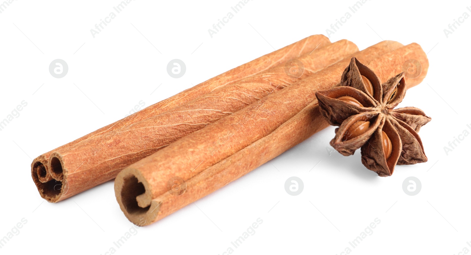 Photo of Cinnamon sticks and anise star isolated on white