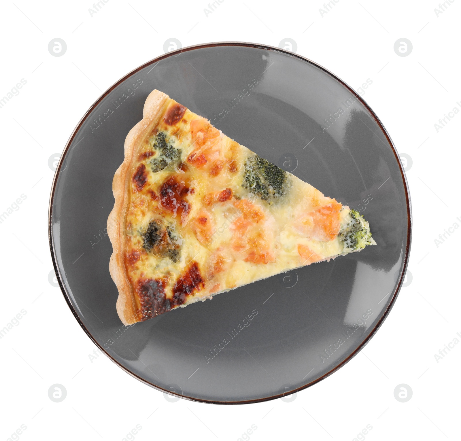 Photo of Piece of delicious homemade quiche with salmon and broccoli isolated on white, top view