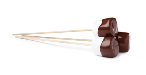 Photo of Tasty marshmallows dipped into chocolate on white background