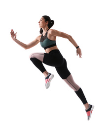 Photo of Athletic young woman running on white background, side view