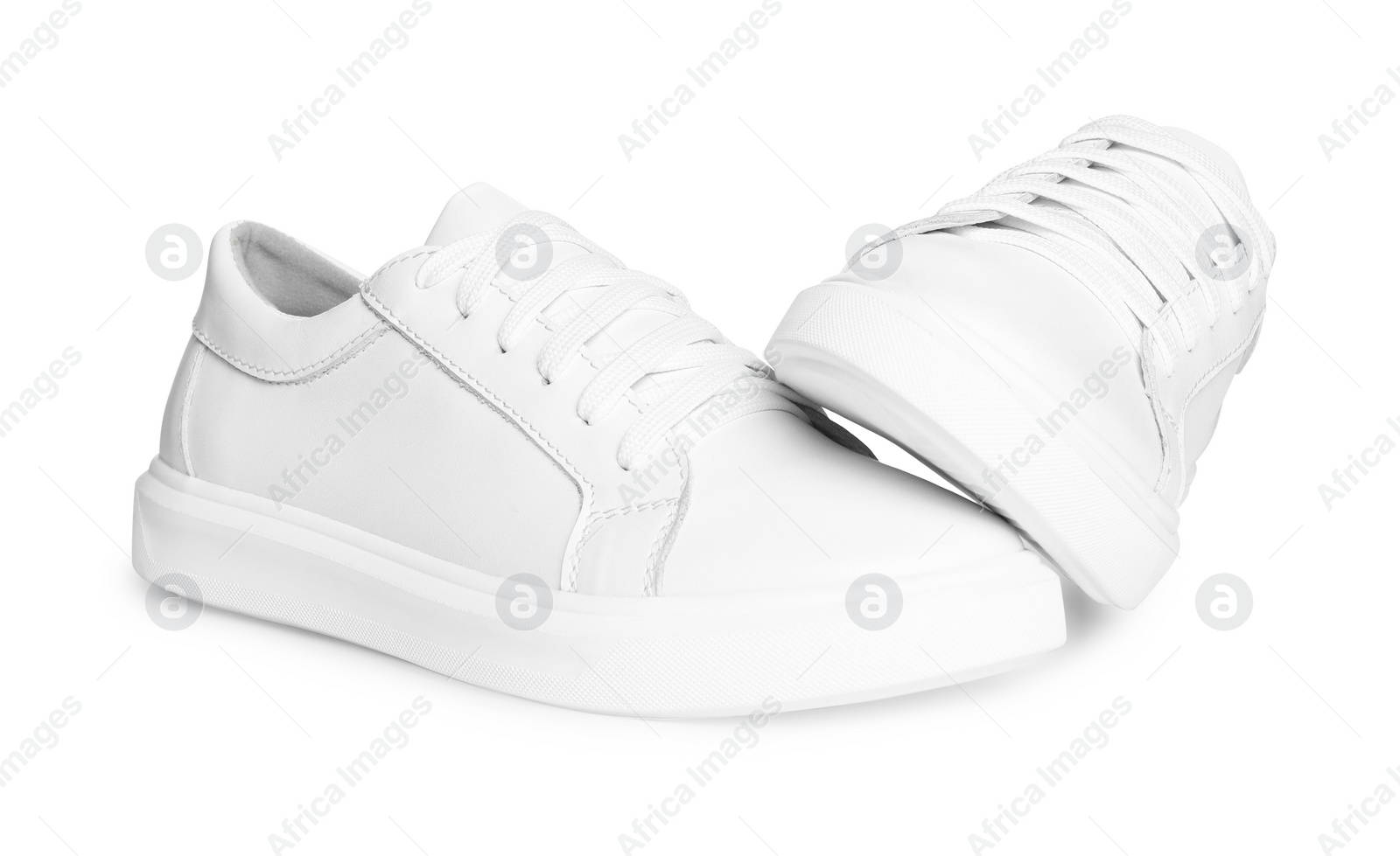 Photo of Pair of stylish sneakers isolated on white