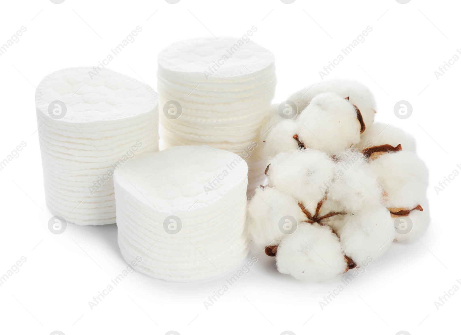 Photo of Composition with cotton pads and flowers on white background