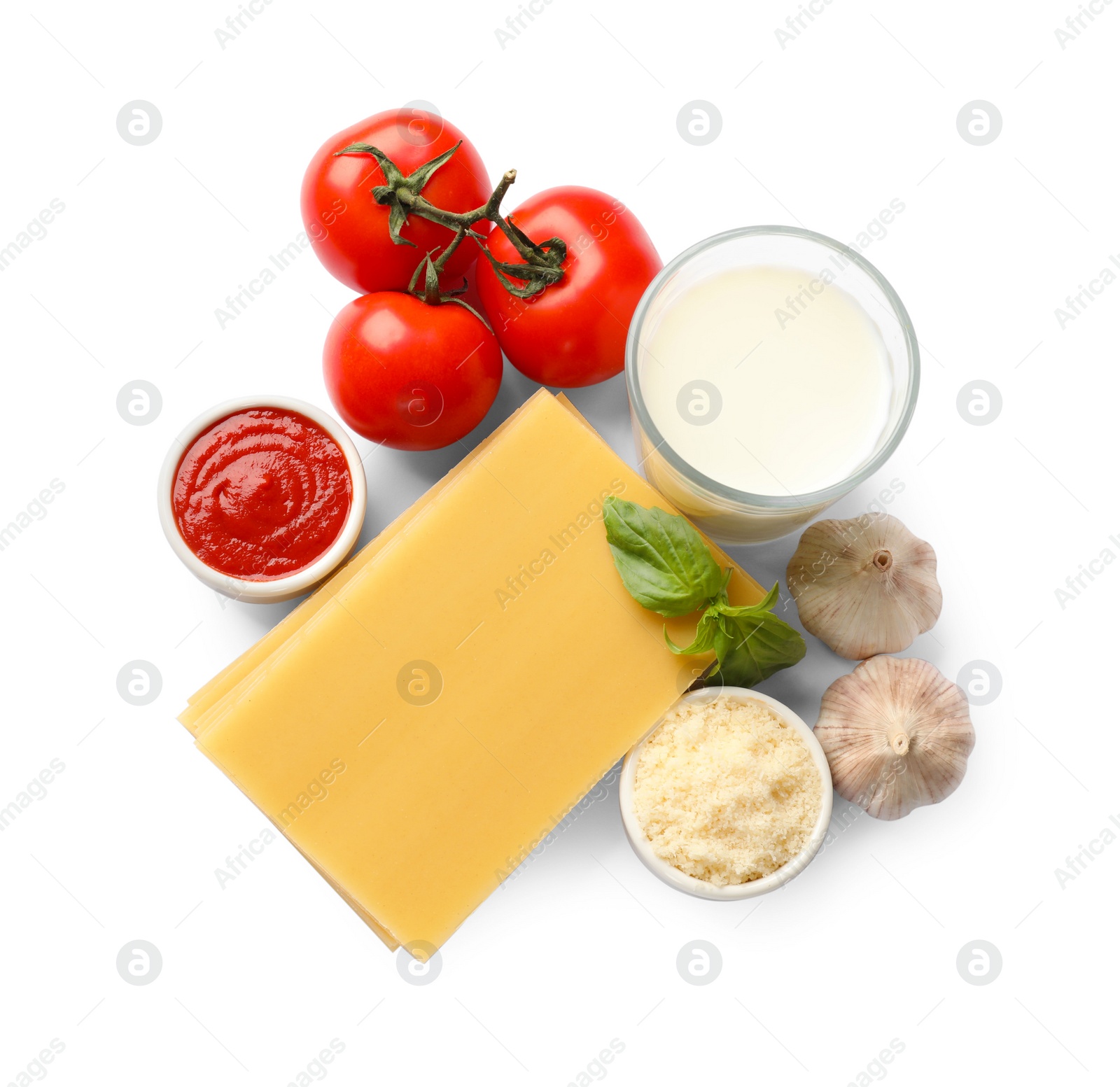 Photo of Uncooked ingredients for lasagna isolated on white, top view