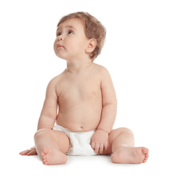 Cute little baby in diaper on white background