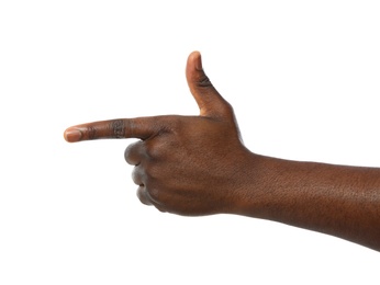 Photo of African-American man pointing at something on white background, closeup