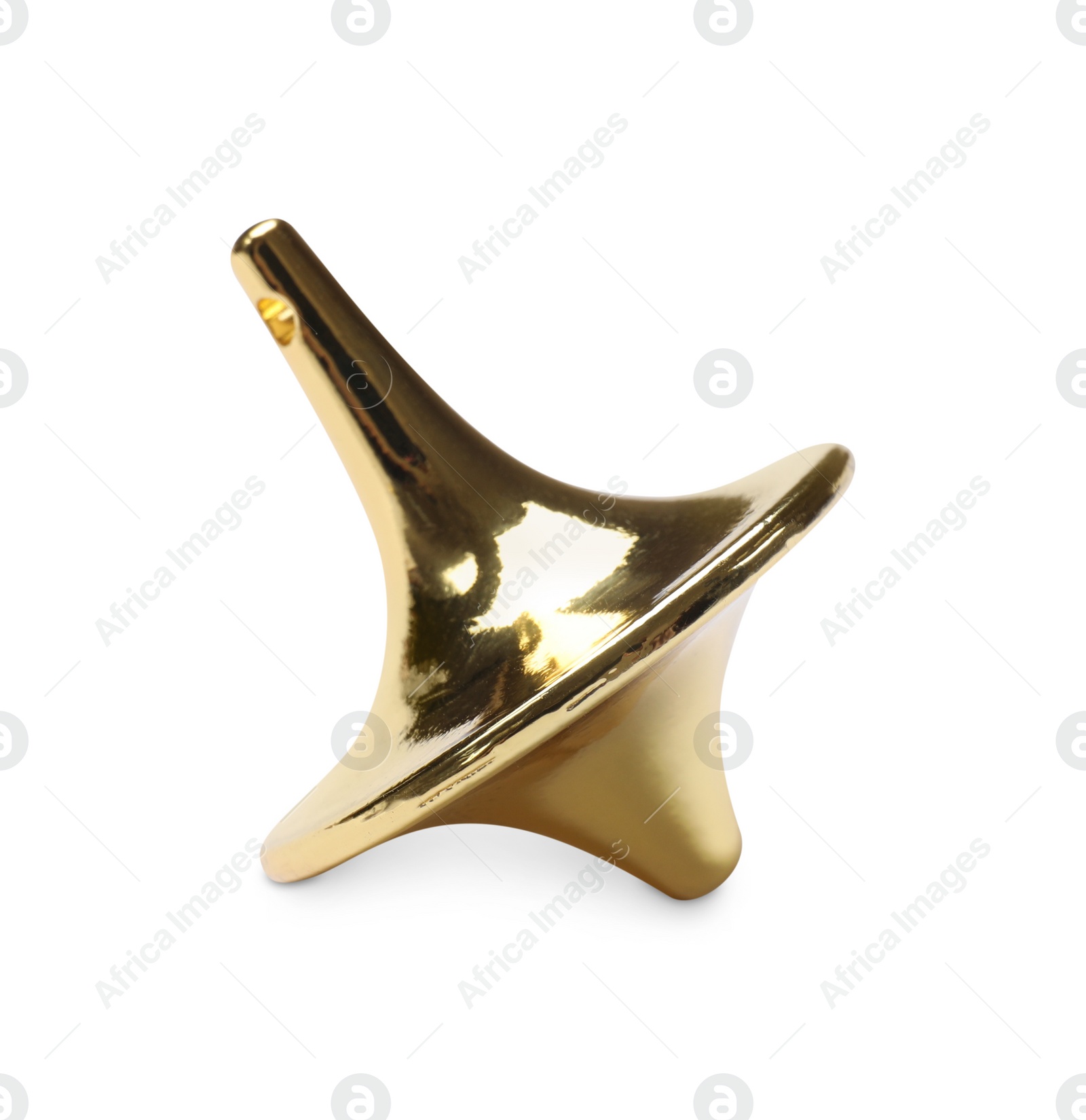 Photo of One golden spinning top on white background