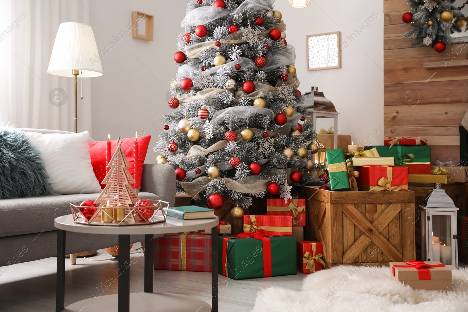 Photo of Beautiful living room interior with decorated Christmas tree