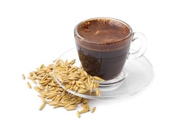 Cup of barley coffee and grains isolated on white