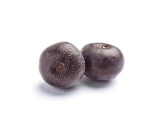 Fresh acai berries on white background