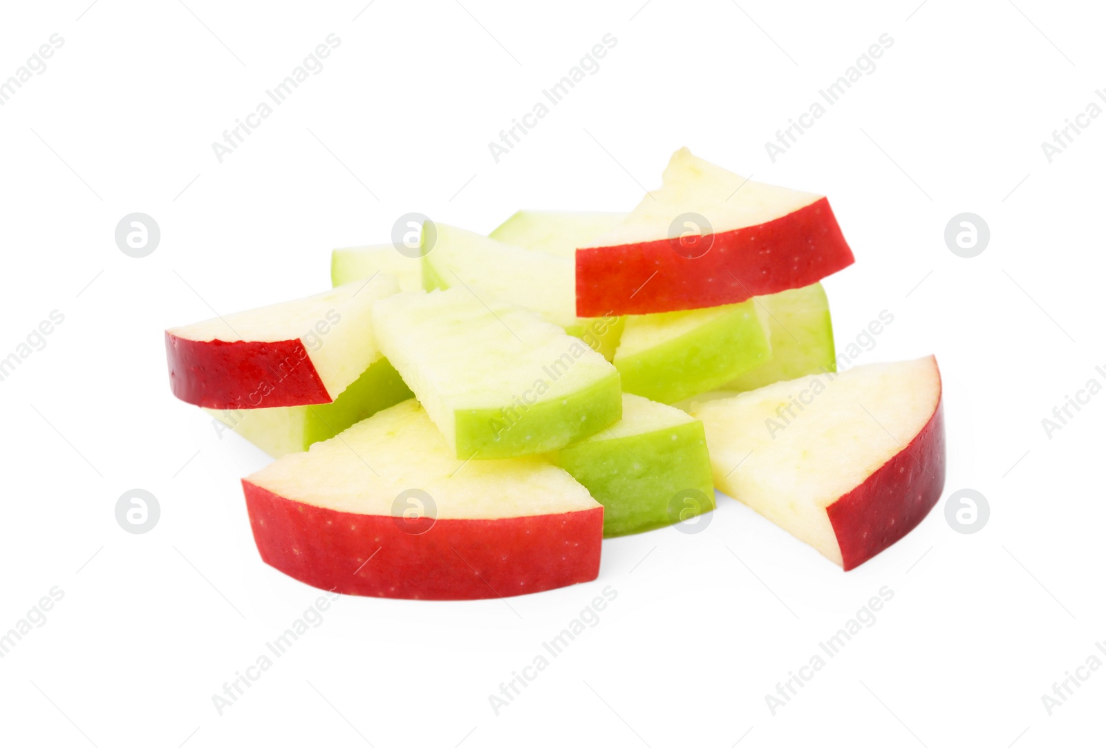 Photo of Pile of apple slices isolated on white