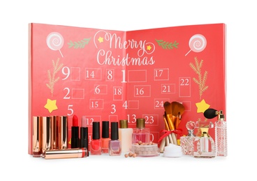 Photo of Christmas advent calendar with different cosmetics and perfumes isolated on white