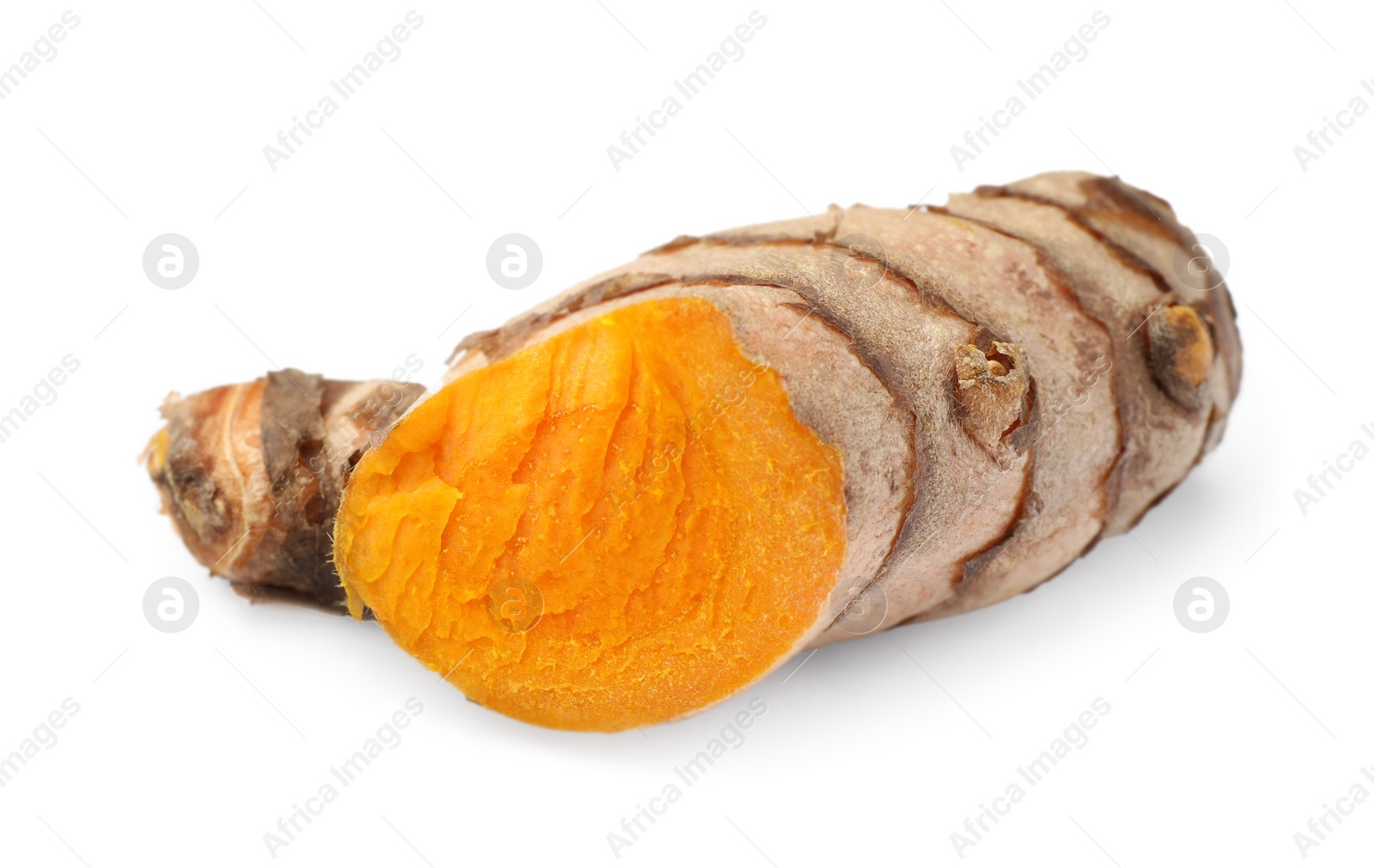 Photo of Fresh cut turmeric root isolated on white