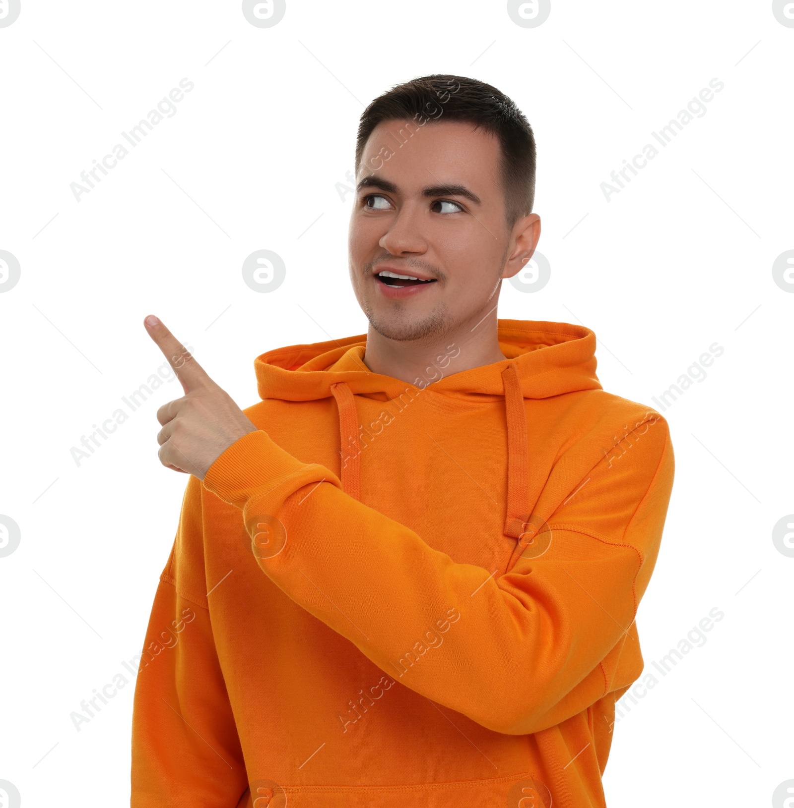 Photo of Special promotion. Happy man pointing at something on white background