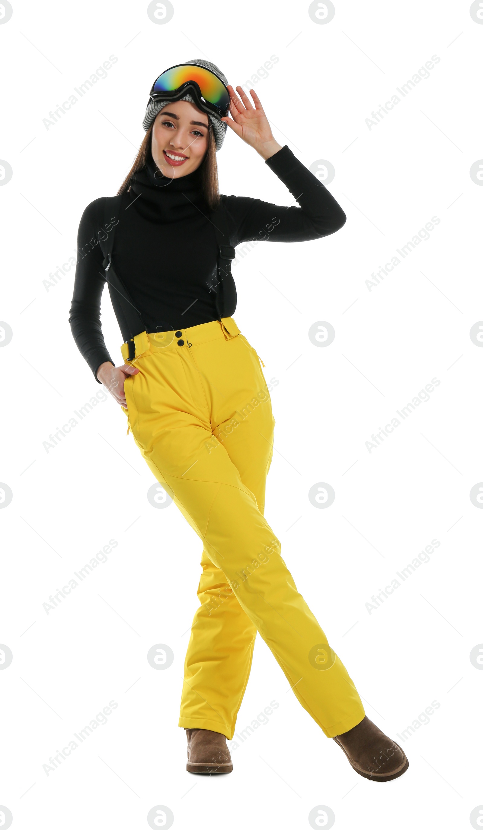 Photo of Woman wearing stylish winter sport clothes on white background