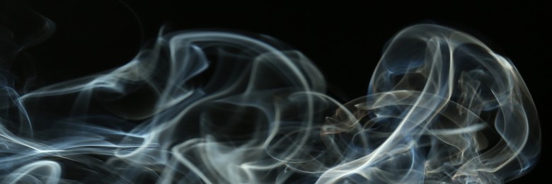 Image of Smoke on black background, closeup. Banner design