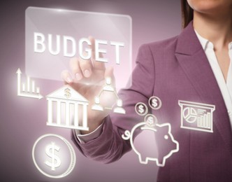 Budget management. Businesswoman using virtual screen with financial icons, closeup