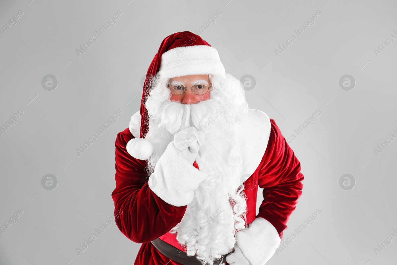 Photo of Portrait of Santa Claus on light grey background