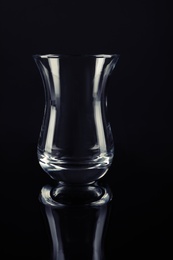 Clean empty transparent glass on black background