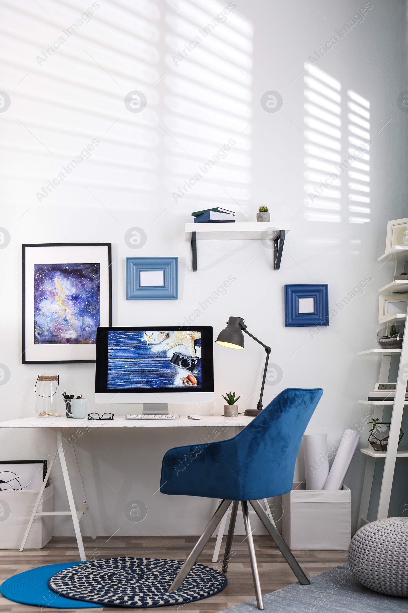 Photo of Home workplace with modern computer and desk in room