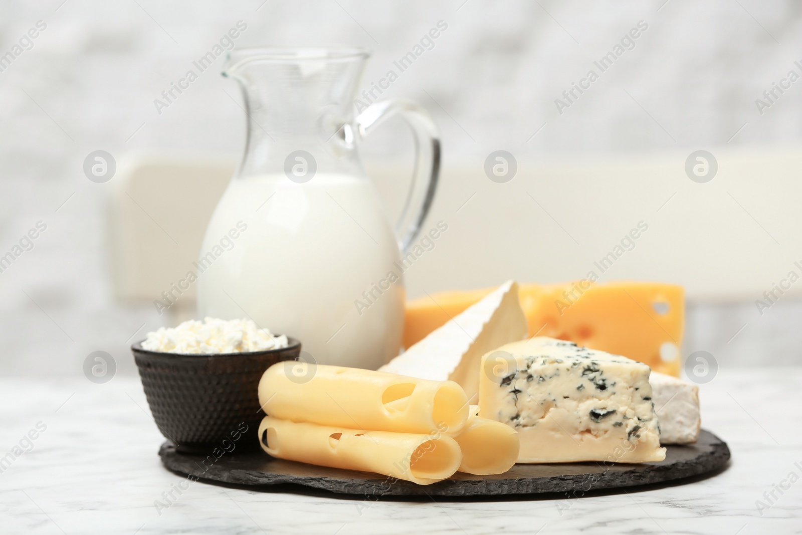 Photo of Different dairy products on table