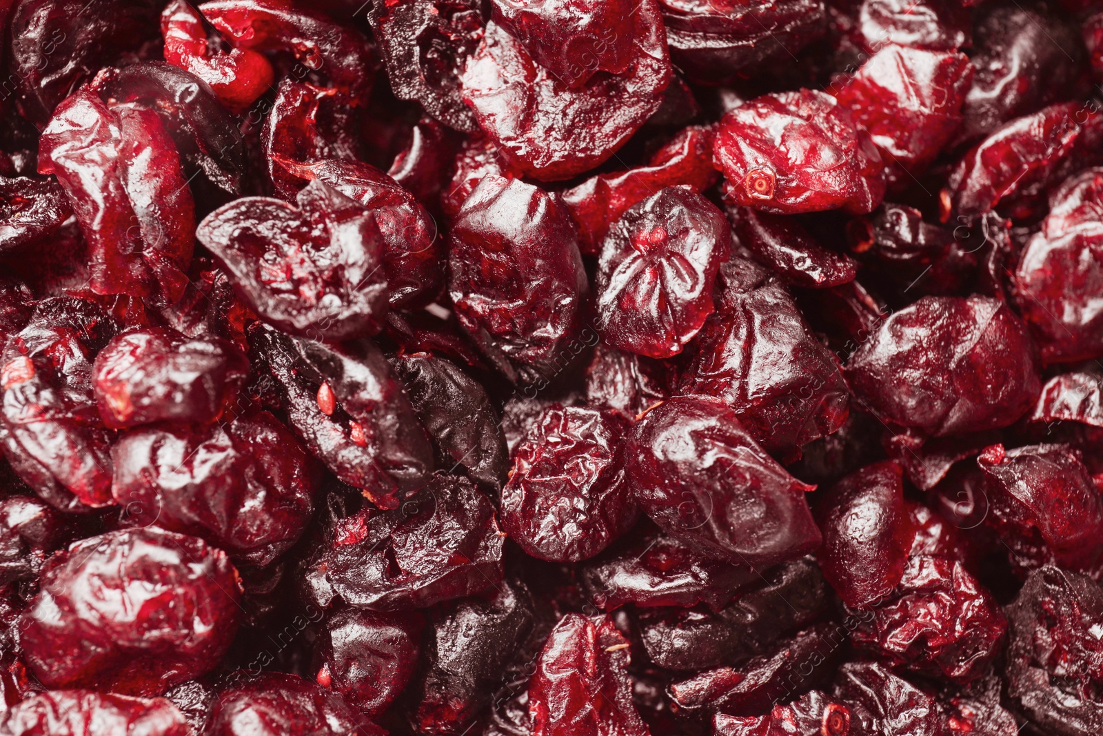 Photo of Many dried cranberries as background, top view