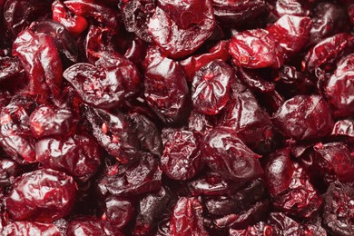 Many dried cranberries as background, top view