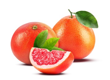 Image of Fresh whole and cut grapefruits isolated on white