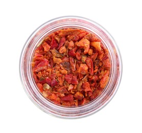 Photo of Aromatic spice. Red chili pepper flakes in jar isolated on white, top view