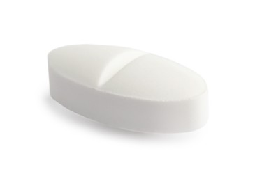 Photo of One pill on white background. Medicinal treatment