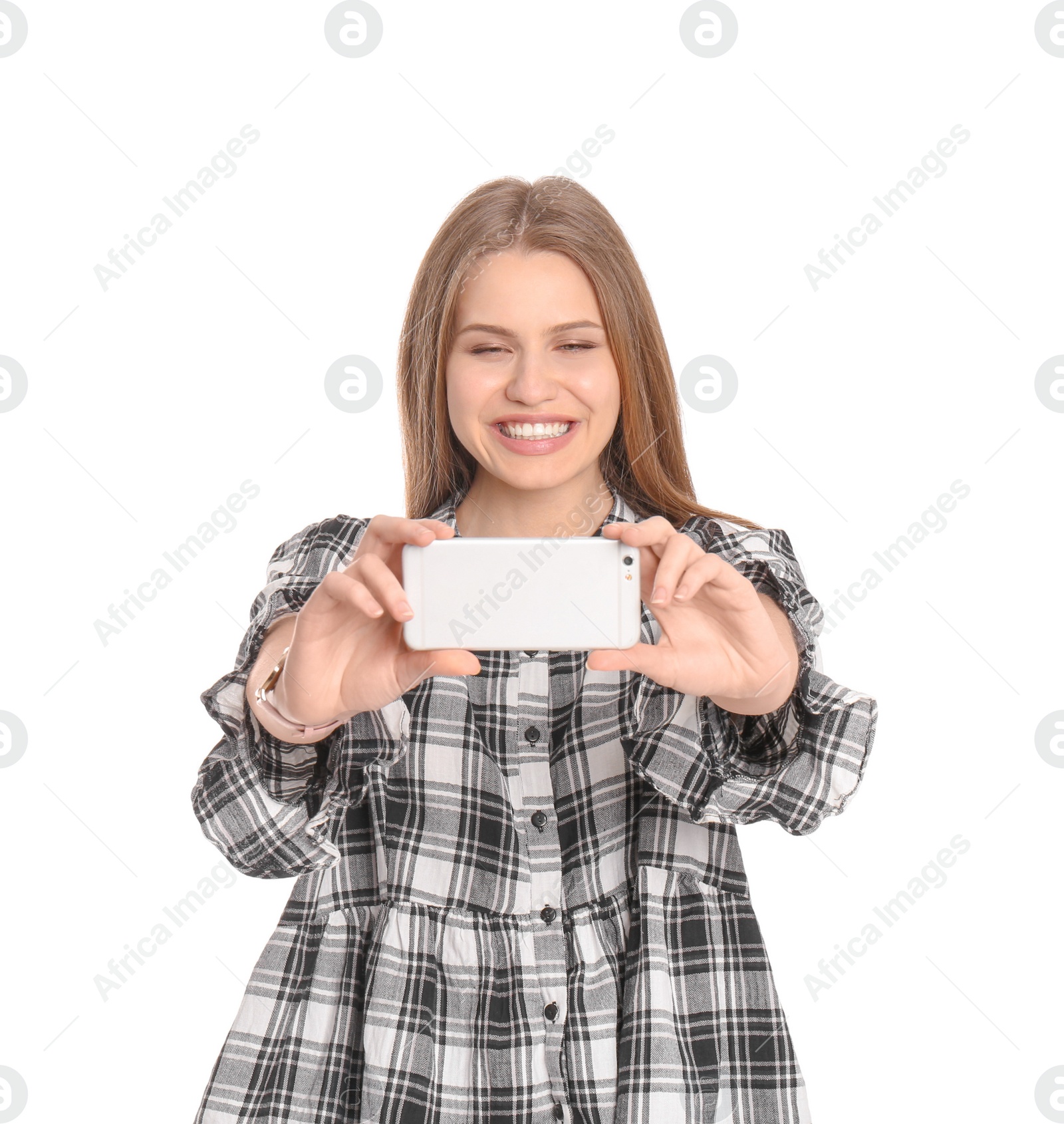 Photo of Young beautiful woman taking selfie against white background