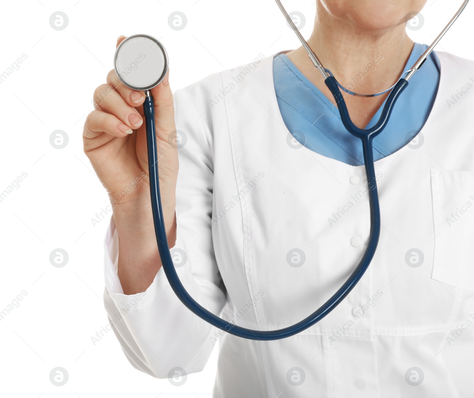Photo of Closeup of female doctor with stethoscope isolated on white. Medical staff