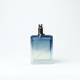 Photo of Transparent bottle of perfume on white background