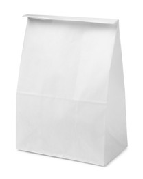 Photo of Closed paper grocery bag isolated on white