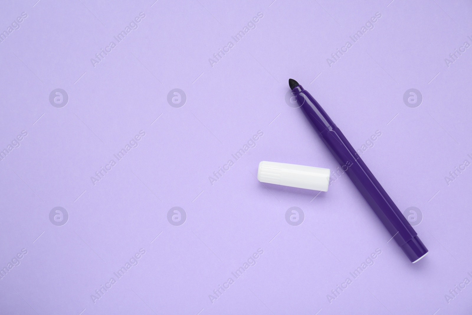 Photo of Colorful marker on light background, flat lay. Space for text