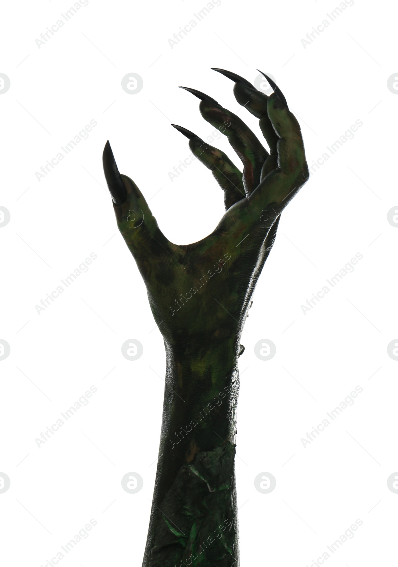 Photo of Scary monster on white background, closeup of hand. Halloween character