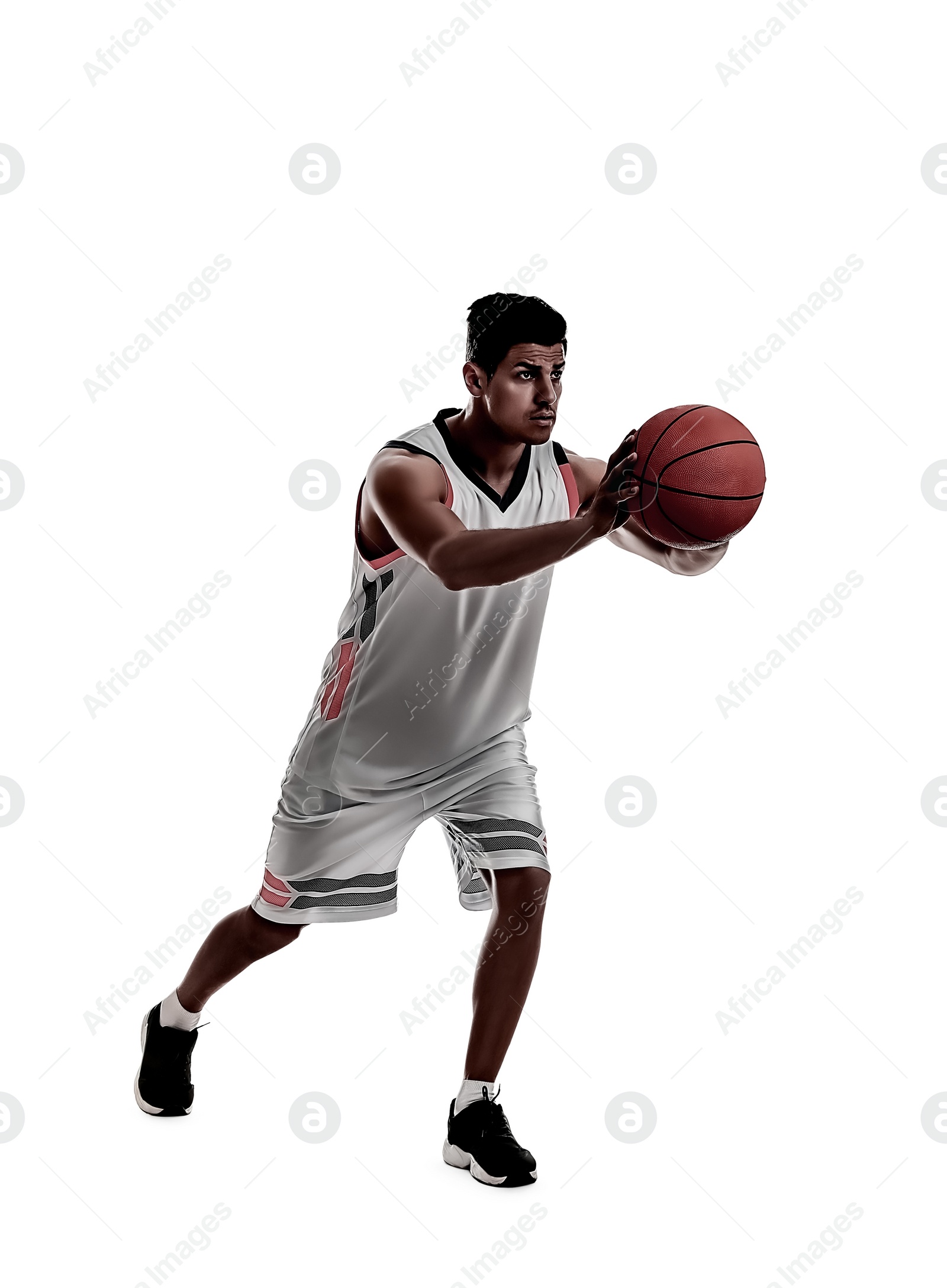 Image of Silhouette of professional sportsman playing basketball on white background