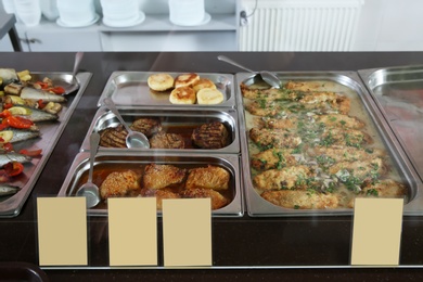 Photo of Containers with healthy food in school canteen