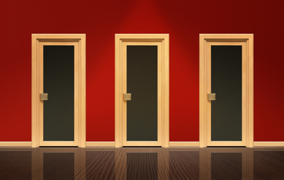 Image of Three similar closed doors in room. Concept of choice