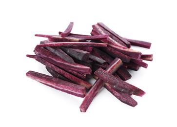 Raw purple carrot sticks isolated on white