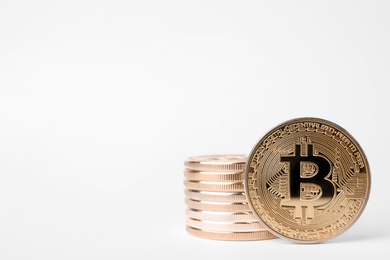 Stack of bitcoins on white background. Digital currency