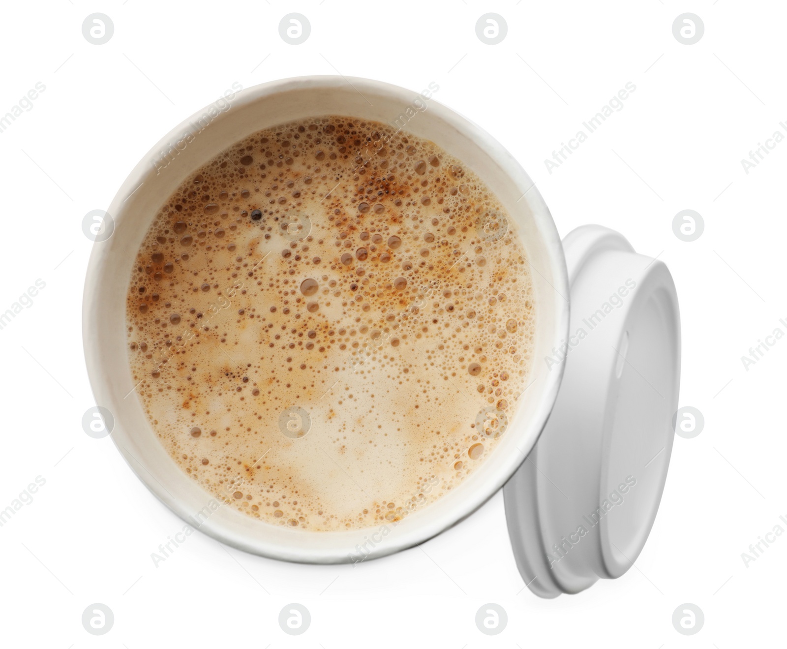 Photo of Aromatic coffee in takeaway paper cup and lid on white background, top view