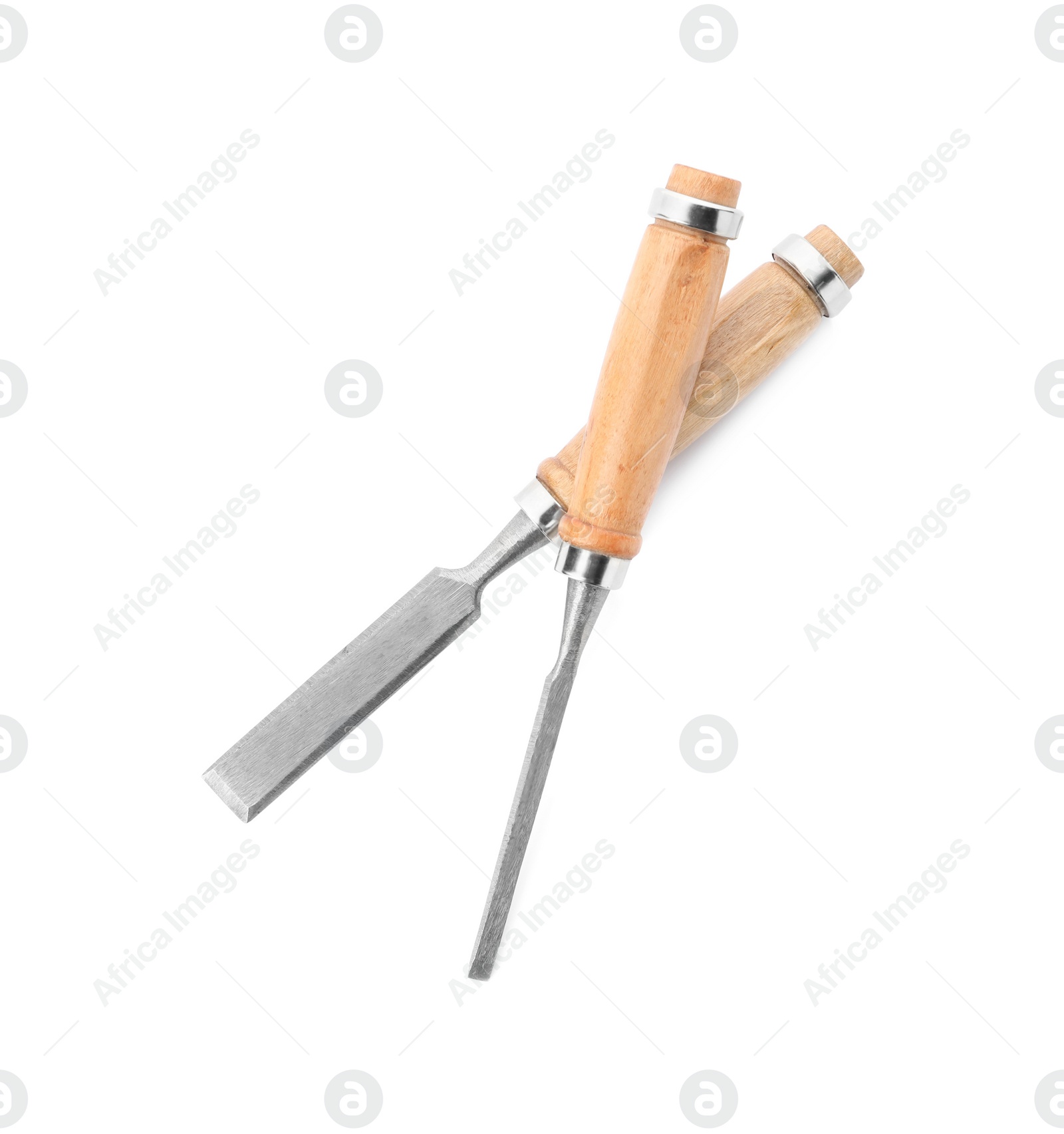 Photo of Modern chisels isolated on white. Carpenter's tools