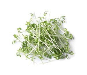 Heap of fresh organic microgreen on white background, top view