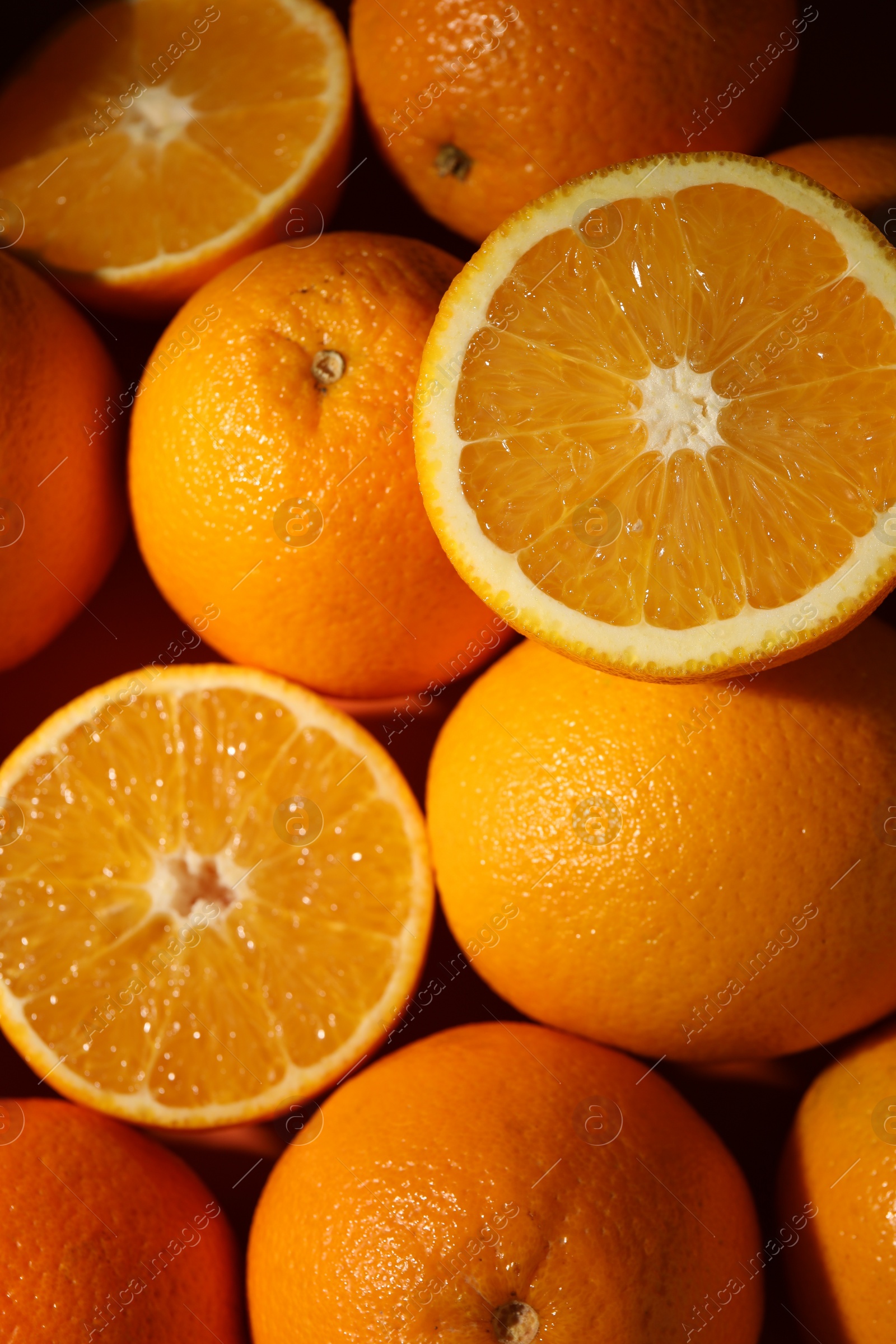 Photo of Tasty ripe fresh oranges as background, top view