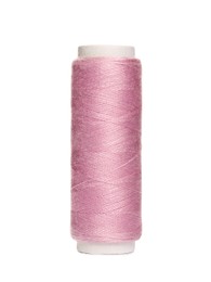 Photo of Spool of pink sewing thread isolated on white