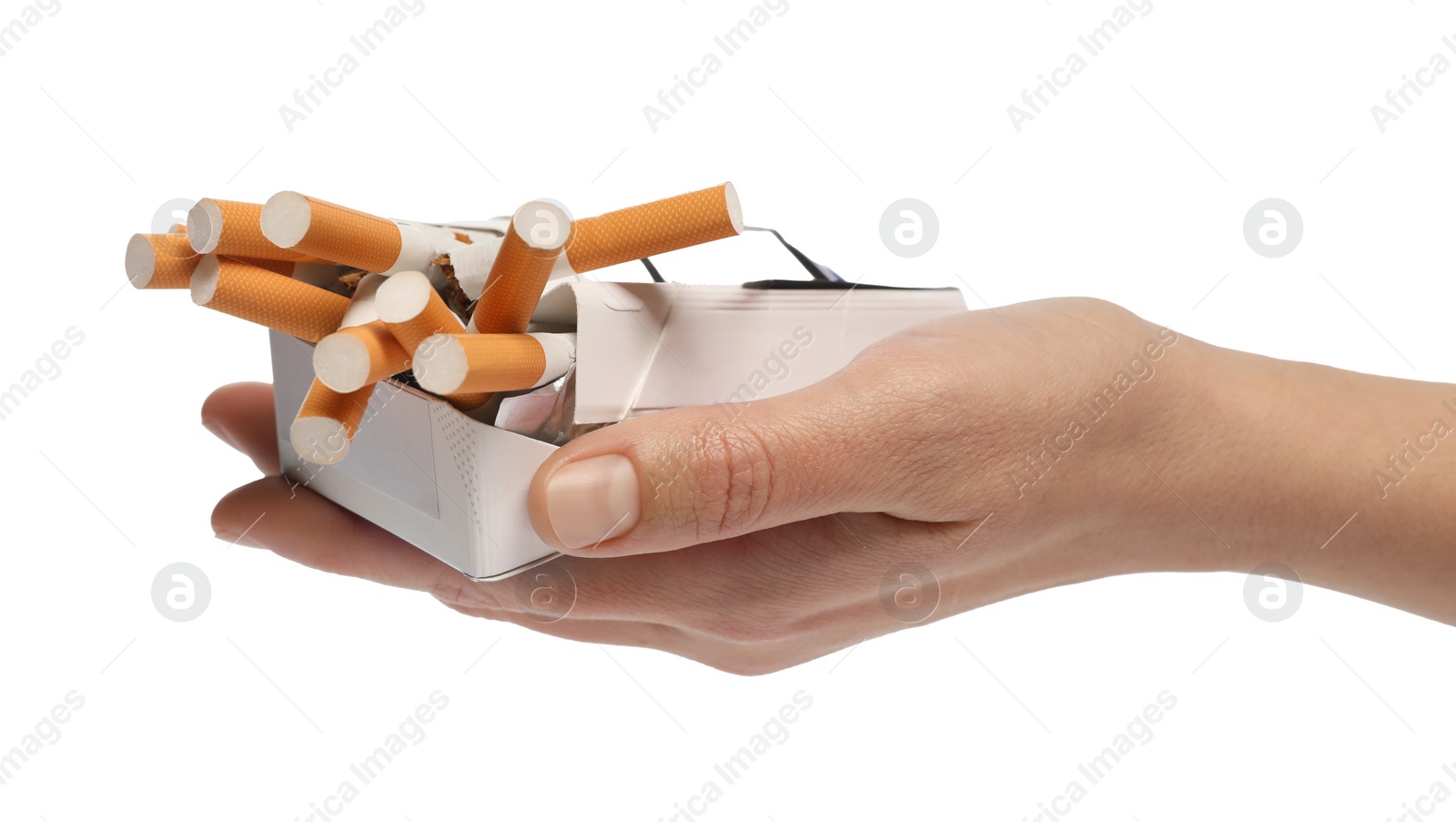 Photo of Stop smoking. Man holding pack with cigarettes on white background, closeup