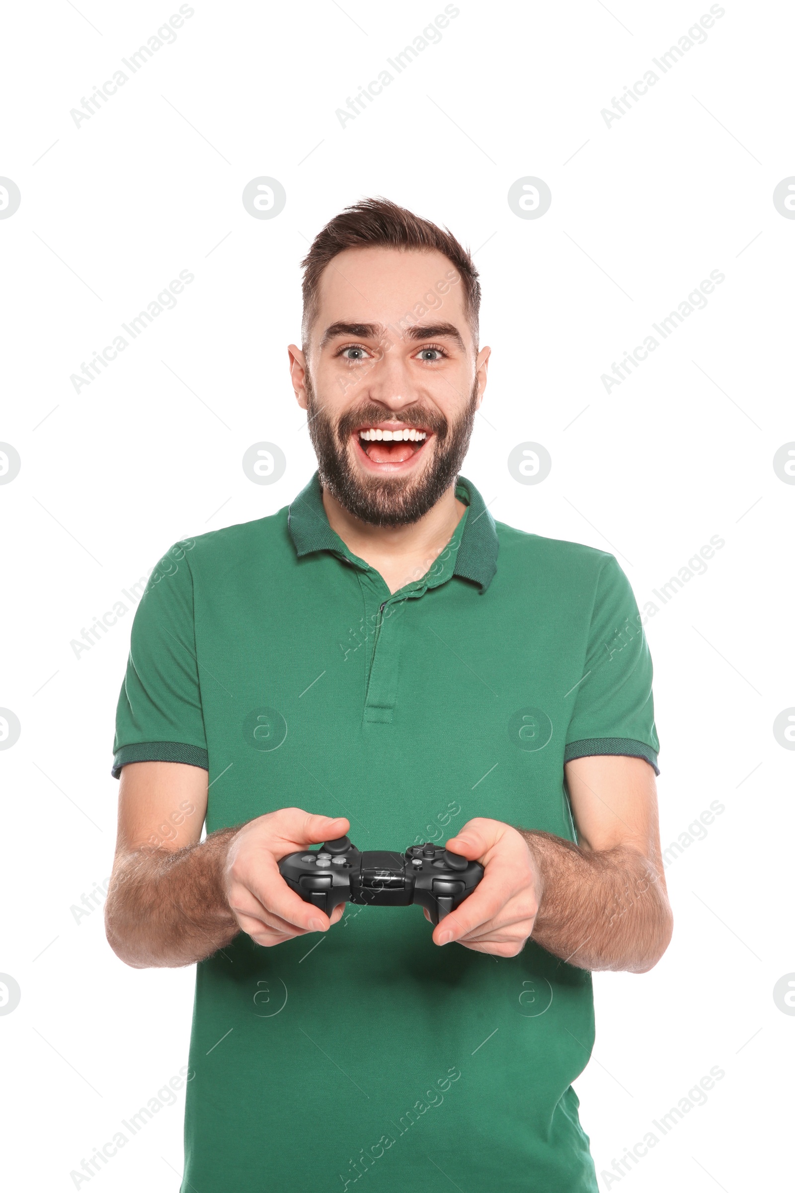 Photo of Emotional young man playing video games with controller isolated on white