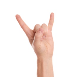 Photo of Man showing rock gesture on white background, closeup of hand