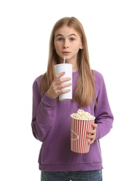 Photo of Emotional teenage girl with popcorn and beverage during cinema show on white background